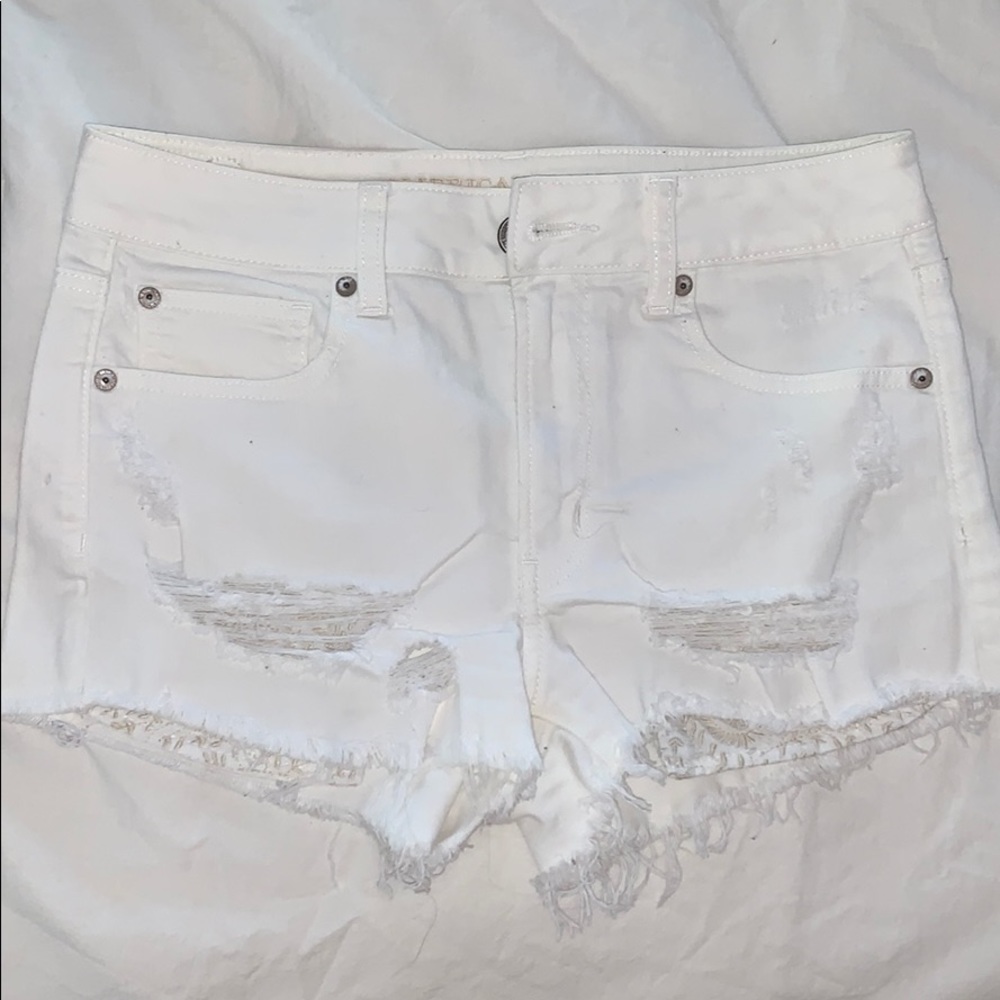 white distressed AE shorts